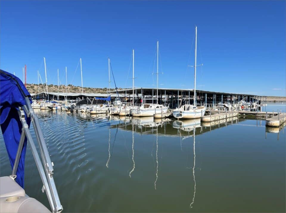 Marina del Sur with many boats docked in the water at Elephant Butte Lake.