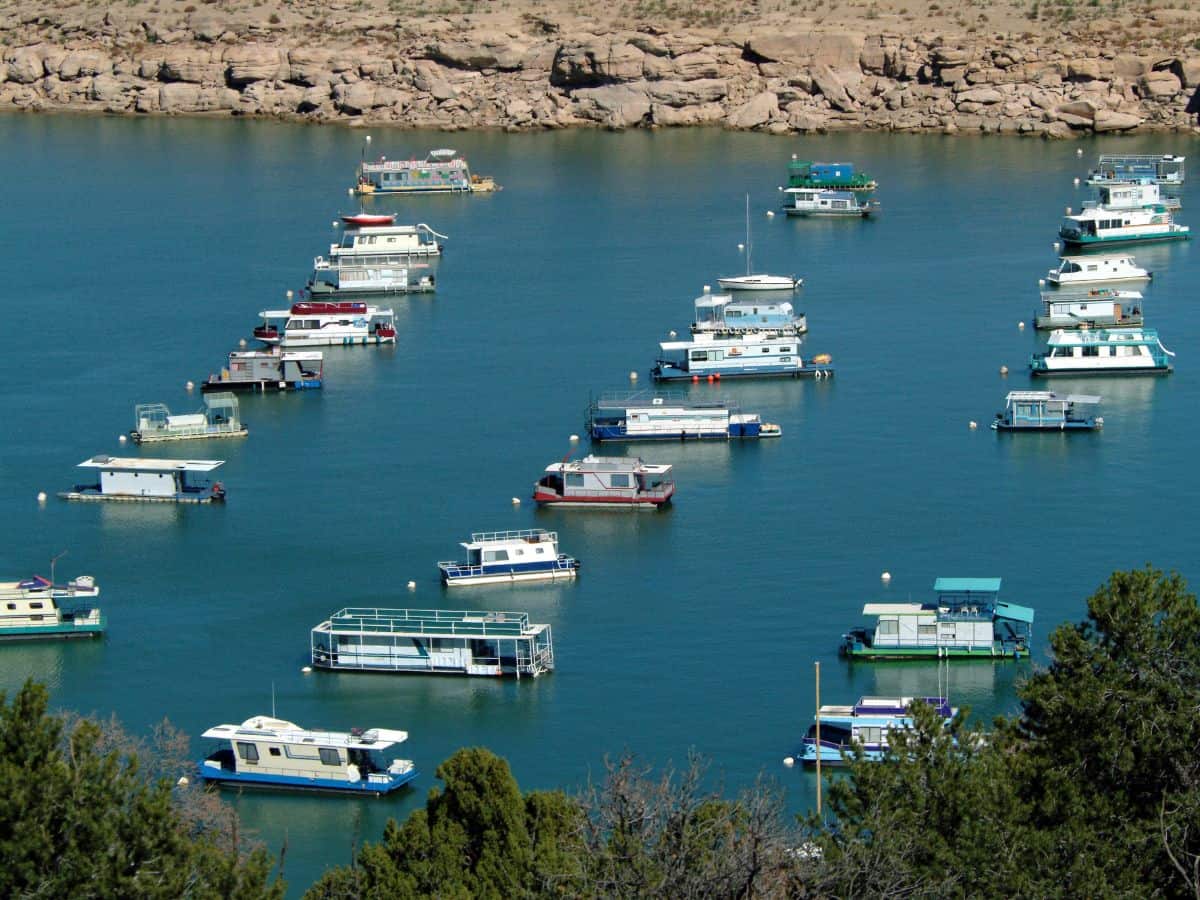 A group of boats on Navajo Lake.